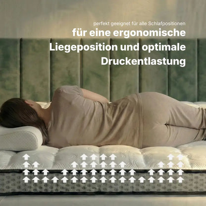 Seitenschläferin liegt auf Gelschaum-Topper, der sich ergonomisch an den Körper anpasst und durch gleichmäßige Druckentlastung für eine gesunde Liegeposition sorgt